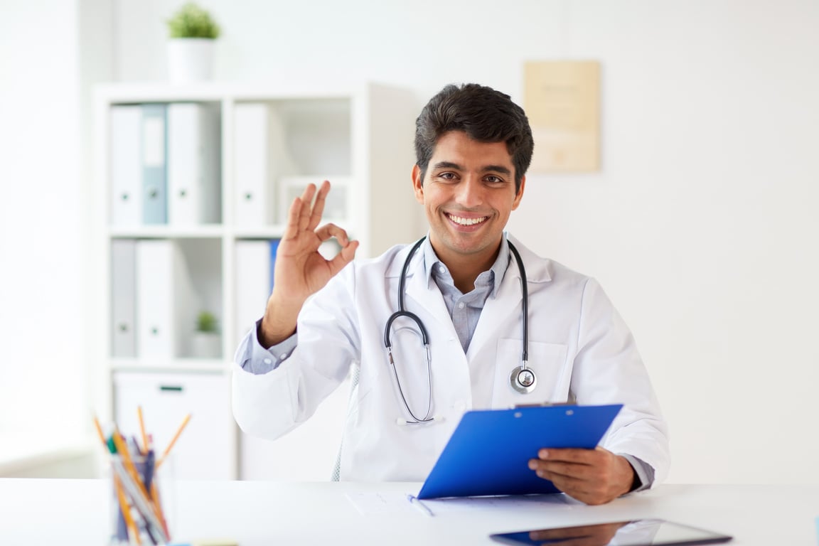 Happy Doctor with Clipboard